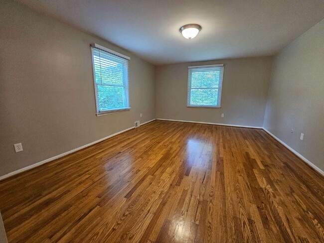 Building Photo - Private 4 Bedroom Home on 0.75 Acres with Great Room Fireplace, Wet Bar & 3-Season Room, 2 Car At...