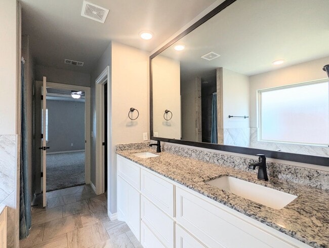 Building Photo - Beautiful Edmond Home | Gas Fireplace, Storm Shelter & Fenced Backyard!