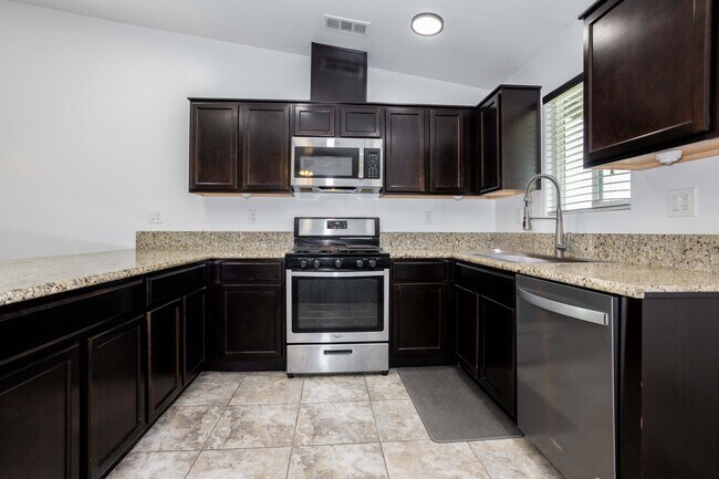 Building Photo - 6212 Ajooni Ct