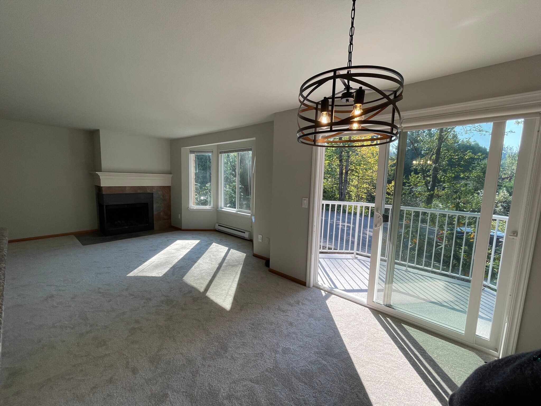 contemporary fixture and cozy fireplace - 280 NW Holly St