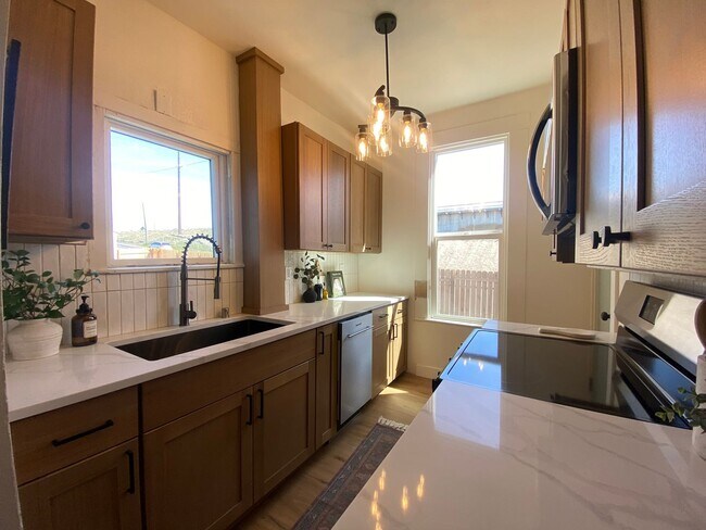 Building Photo - Totally remodeled 3-bedroom, 2-bath available now near Spokane Community College with large shop