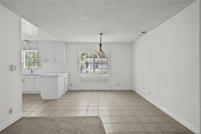 Building Photo - 10528 1/2 Hillhaven Avenue, Los Angeles, CA 91042 - 4 BR 3 BA house