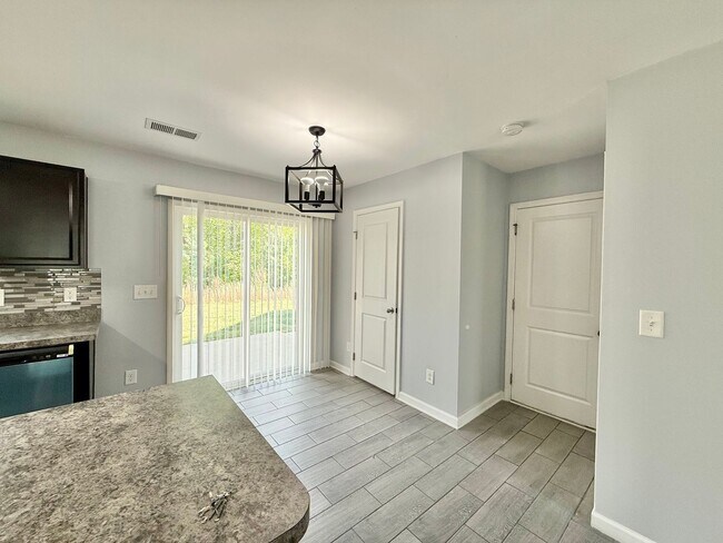 Building Photo - Charming 3BD, 1.5BA Clayton Home Near Shopping and Dining with Modern Updates