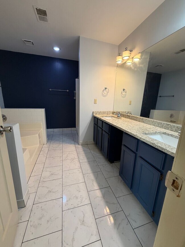 Building Photo - 4 Bedrooms with Finished Basement and Bonus Room!