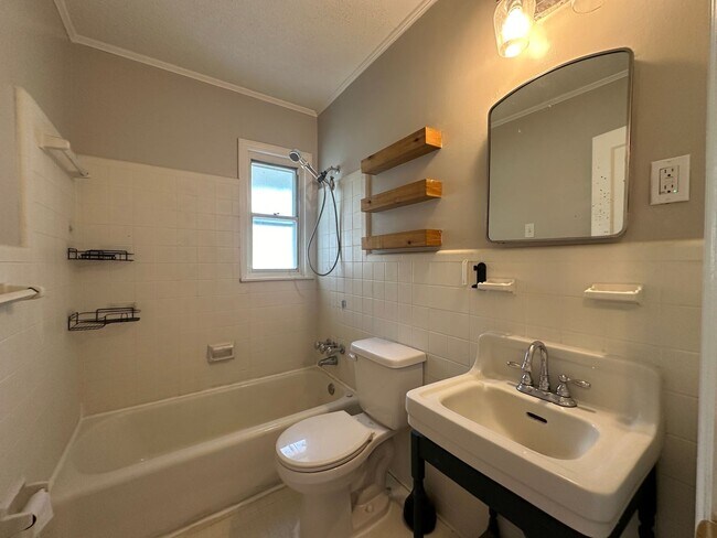 Building Photo - 1/2 OFF FIRST FULL MONTH'S RENT! Gated Par...