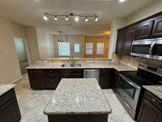 Building Photo - Argyle ISD Gem with Huge Private Backyard & Open Floorplan