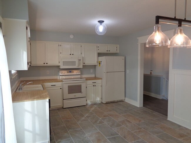 Building Photo - Nice! Updated House with Unfinished Basement-Ready for Move-In