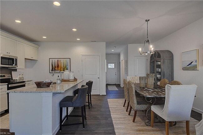 Building Photo - Three Bedroom Available