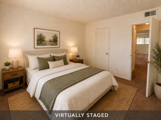 Building Photo - Updated 2 bedroom 1 bath condo in a quiet park like setting with a community pool