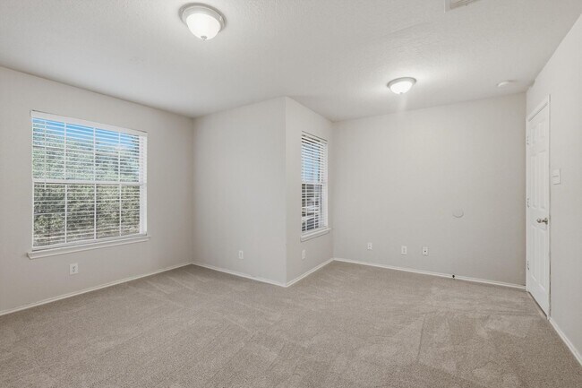 Building Photo - 4BR Home with Open Living Area & Included Appliances