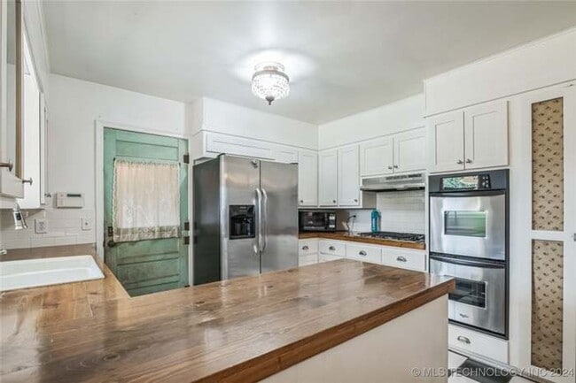 Building Photo - Spacious 4BR House in Tulsa