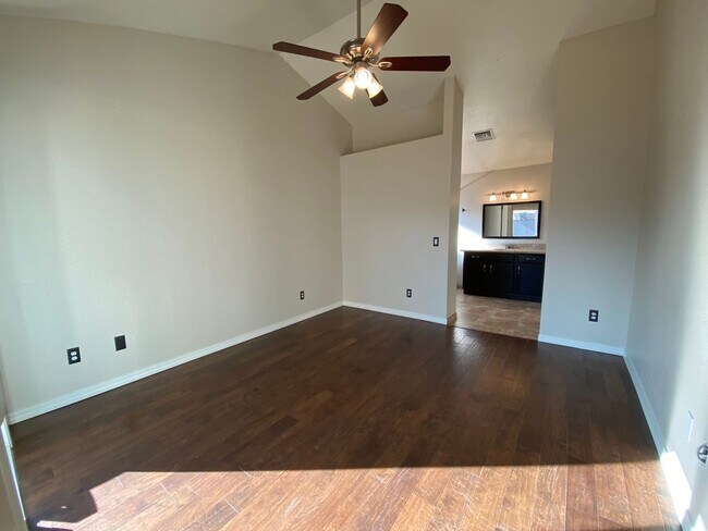 Building Photo - Quaint Retreat: 2BR/2BA Haven with Private Yard, Vaulted Ceilings & Cozy Fireplace