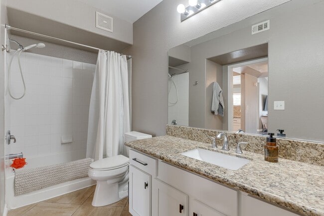 Building Photo - Bright & Airy 2-Bedroom Condo with Dual Su...