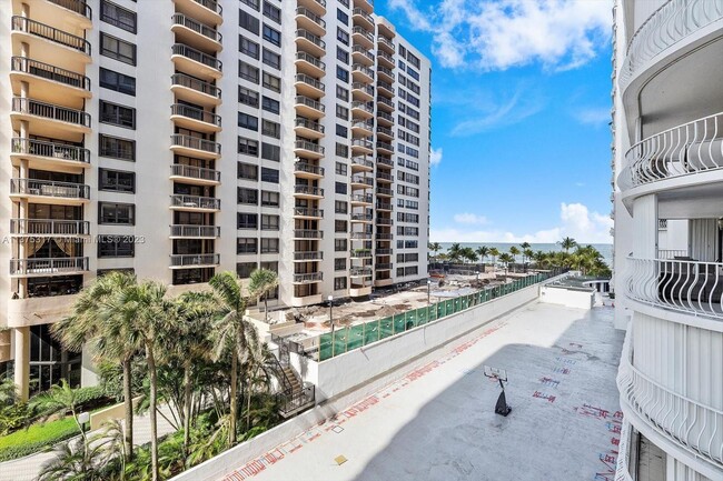 Building Photo - 10155 Collins Ave