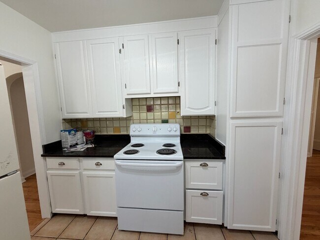 Building Photo - Classic Wash Park Gem with Detached Garage, Finished Basement & Stunning Great Room Addition