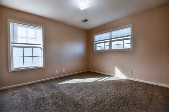 Building Photo - Pet Friendly Three Bedroom with Bonus!