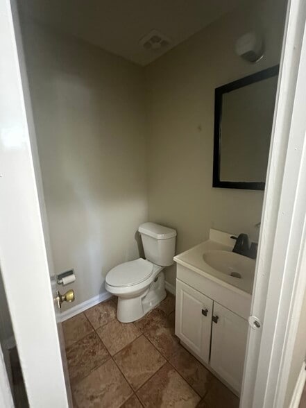 ADA height bathroom guest hidden medicine cabinet - 511 Harris Estate Dr