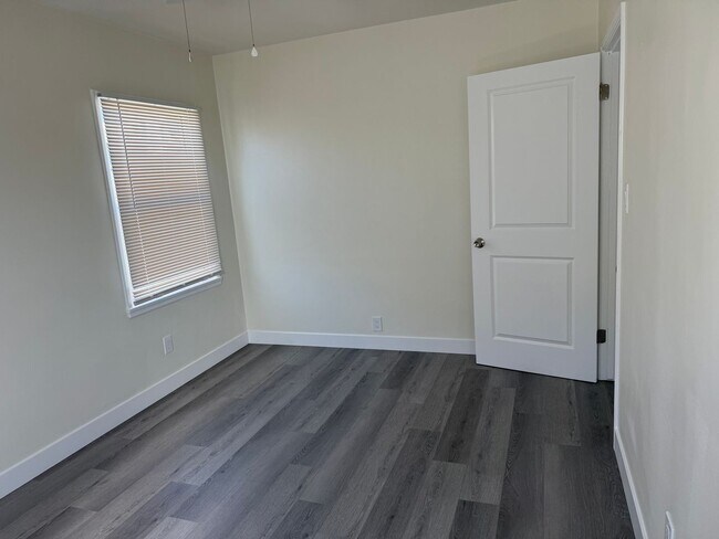 Building Photo - FOR RENT — COMPLETELY REMODELED Apartment