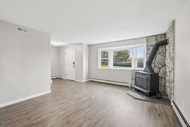 Building Photo - Townhome-Style Living with Greenbelt Views, Attached Garage & Community Pool!