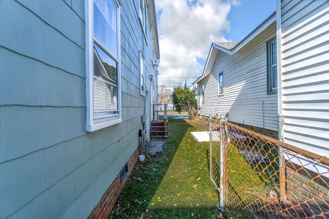 Building Photo - Call Sabrina Thomas' Office at 757-767-076...