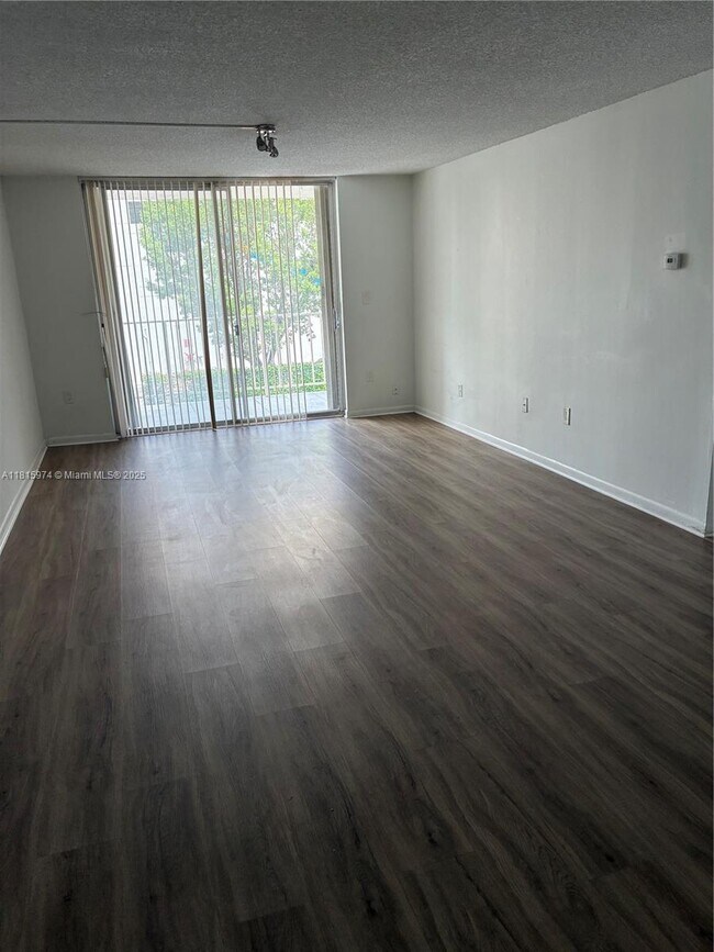 Building Photo - 4675 W 18th Ct
