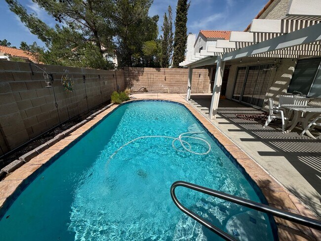 Building Photo - Two story home with sparkling private pool.