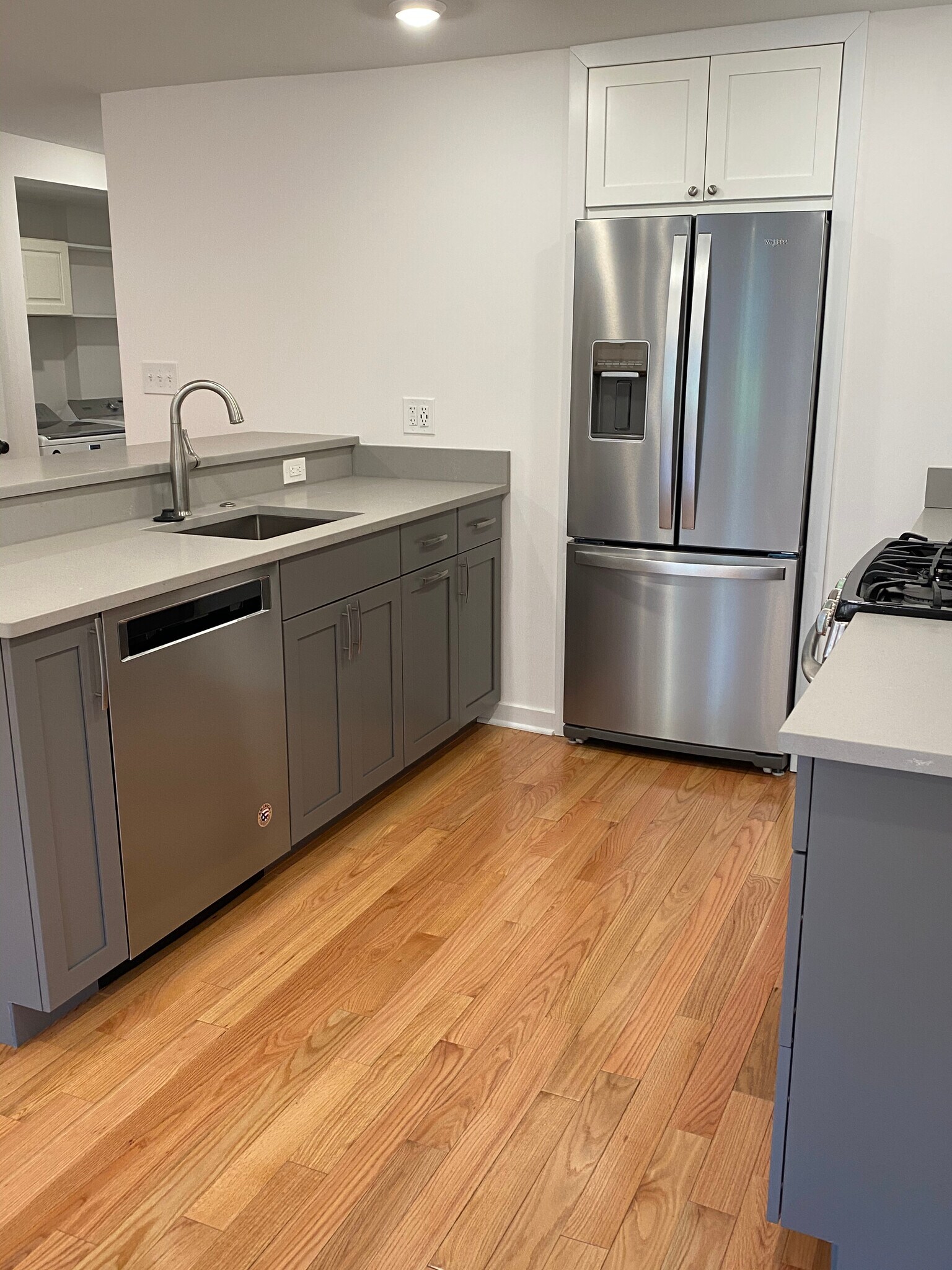Kitchen includes gas stove, DW, microwave - 104 8th St NE