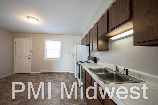 Building Photo - "Charming 2-Bedroom Retreat with 800 Sq. Ft. of Comfort in New Palestine!"