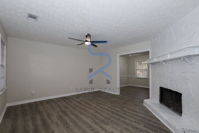 Building Photo - Move in before December 31st and choose your reward: a $250 Amazon Gift Card or a 55" Smart TV!