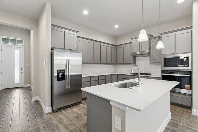 Building Photo - A Refined New Construction Residence in the Distinguished Eagle Creek Community