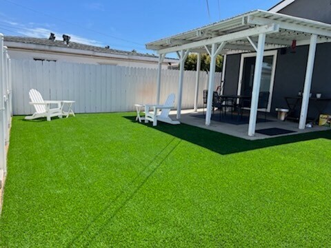 Private back yard w/ artificial turf. Great for entertaining! - 3673 Cherokee Ave