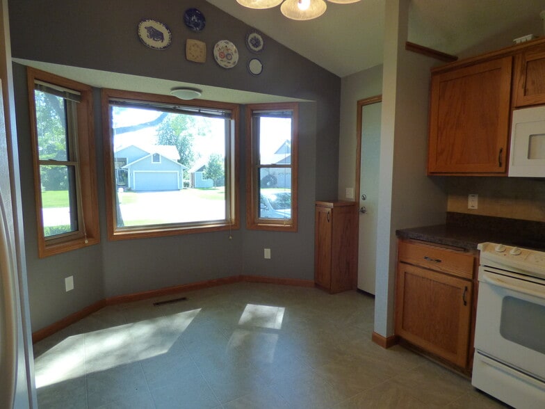 Convenient garage access into kitchen makes it easy to unload groceries - 8475 168th St W