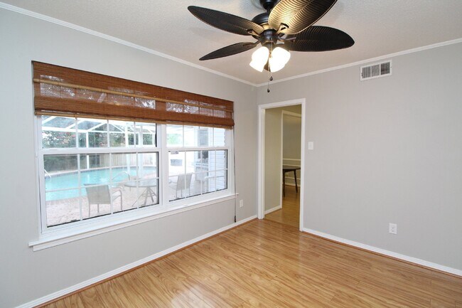 Building Photo - Pool Home with Office, Two Primary Suites ...