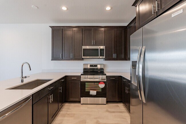 Building Photo - 2024 Luxury Townhome | 2-Car Garage, Quartz Kitchen & Resort Pool