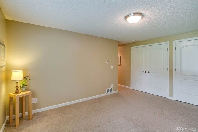 Master Bedroom wall of closets - 4647 W Lake Sammamish Pkwy SE