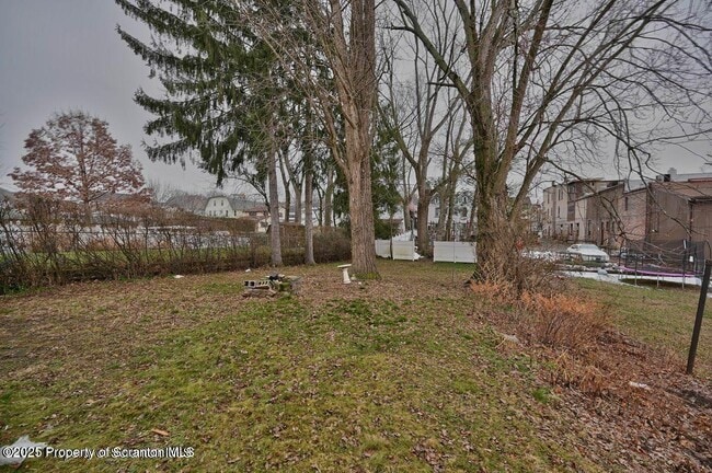 Building Photo - 1416 Capouse Ave