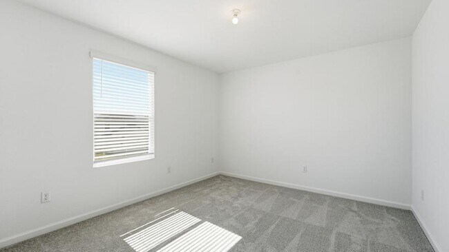 Building Photo - 10761 NW Everbreeze Dr