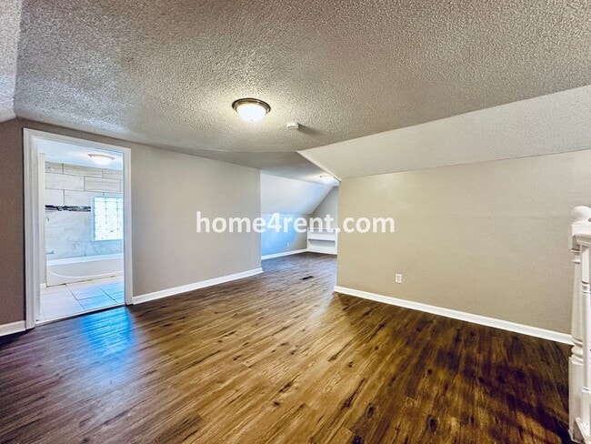 Building Photo - Adorable Home Featuring Wood Floors, SS Ap...