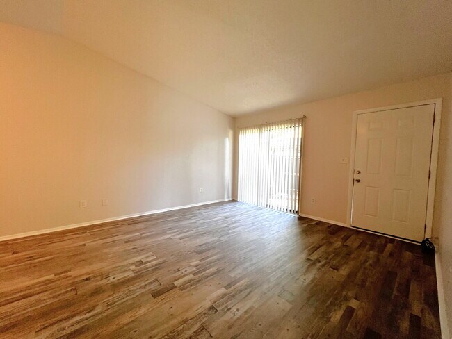 Building Photo - Updated 2BR, 1BA Apartment Off Old Palafox Hwy with LVP Flooring Throughout, Vaulted Ceilings & W...