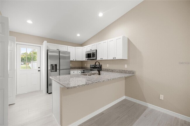 Building Photo - 5795 NW 11th Pl