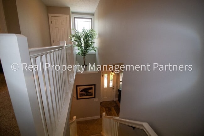 Building Photo - Spacious 3BR Townhome in Lowell | Nature Views & Maintenance-Free Living