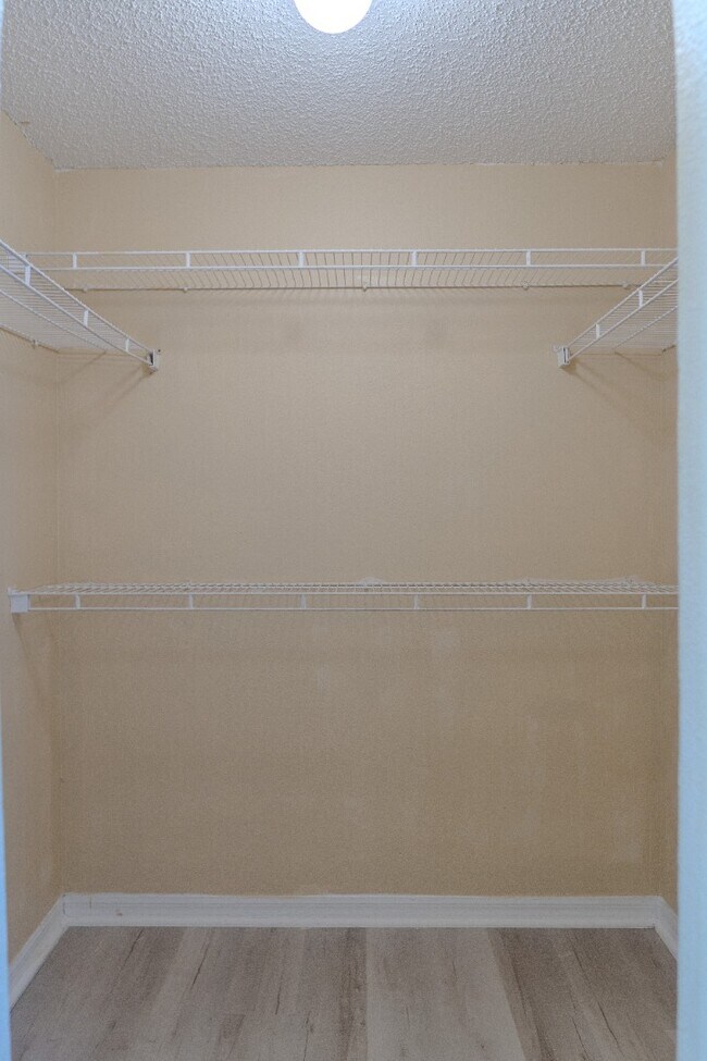 Building Photo - Spacious 4-Bed Groveland Home with Attached Garage, Central Air, and Private Patio