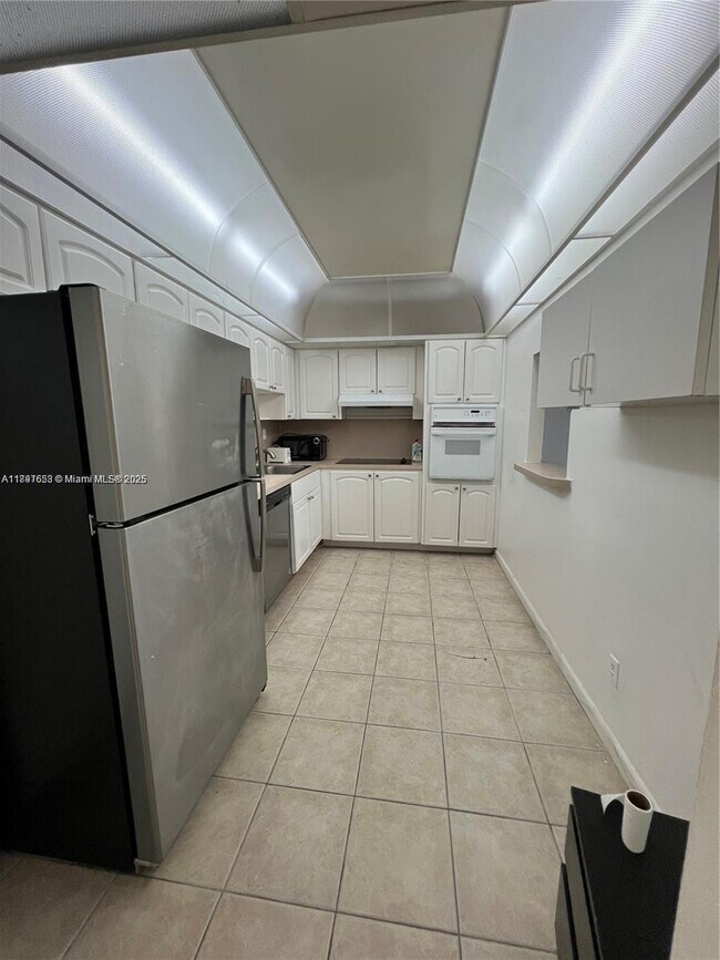 Building Photo - 19380 Collins Ave