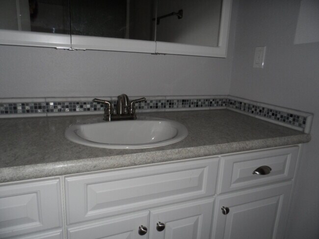 Building Photo - Inviting 3-Bedroom Home with Workshop/Storage and Outdoor Space