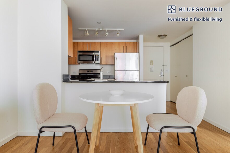 Building Photo - 4-75-75 48th Ave