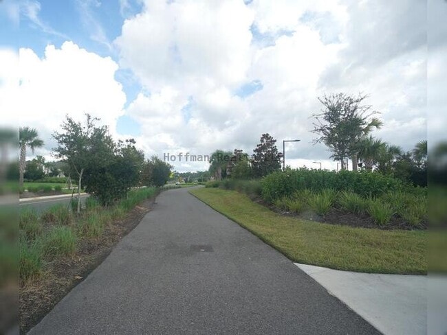 Building Photo - Stunning 5-Bedroom Lakeview Home in River Landing, Wesley Chapel