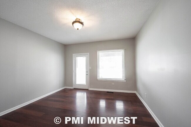 Building Photo - "Charming Urban Duplex Retreat: Cozy 2-Bedroom, 1.5-Bath Oasis in Vibrant Indianapolis!"