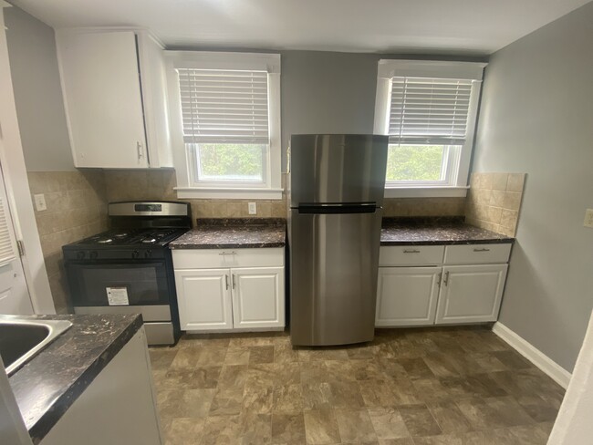 Kitchen with new stainless steel stove and refridgerator - 606 N Woodington Rd