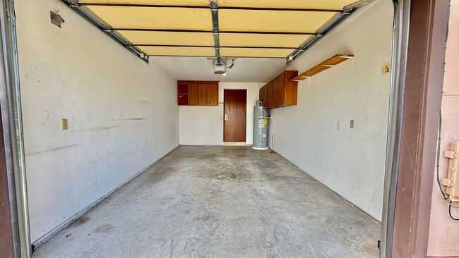 Building Photo - Two Bedroom Townhome with Yard & Attached ...