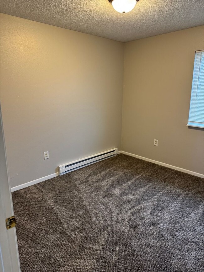 Building Photo - Whispering Pines